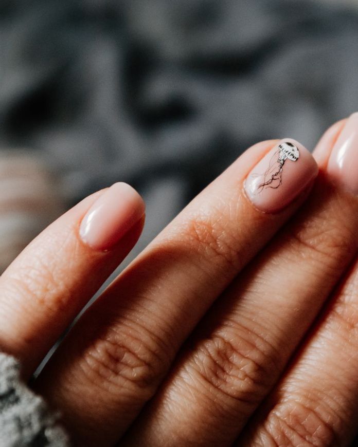 Nude gel manicure on short almond nails